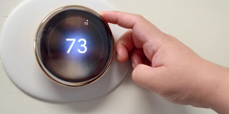 Setting your thermostat to this temperature could save you money (and keep you cozy)